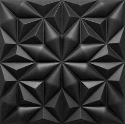 A close-up, studio shot of a black 3D wall panel with a geometric, faceted design.