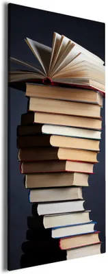 Produktbild von Wallario Premium Leinwandbild Bücherstapel in Größe 60 x 150 cm