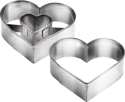 Two heart-shaped cookie cutters, one nested inside the other, are shown against a white background.