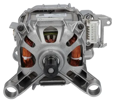 A close-up view of a washing machine motor with visible copper windings.