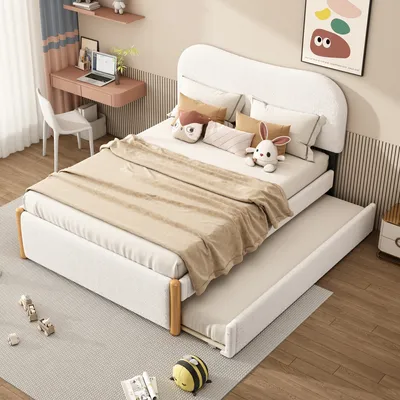 A bedroom scene with a bed, desk, and chair, decorated with children's items.