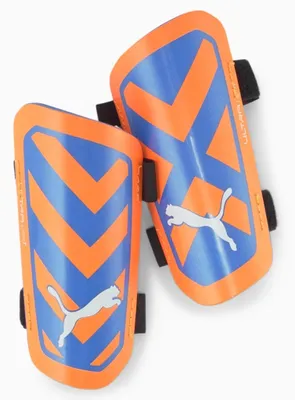 Imagen del producto de PUMA Ultra Light Strap - Protectores para espinillas 01 - color naranja intenso/azul brillante, talla XL