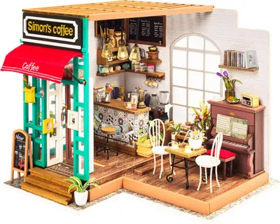 A miniature diorama of a coffee shop called Simon's Coffee.