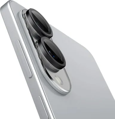 A close-up, angled view of the rear camera lenses of a silver smartphone.