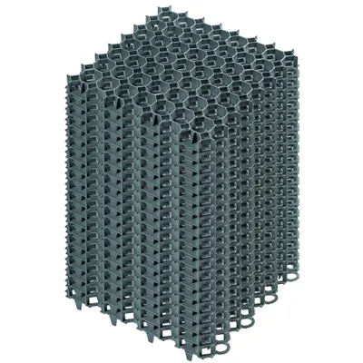 A stack of grey plastic grid modules, likely for landscaping or ground reinforcement.