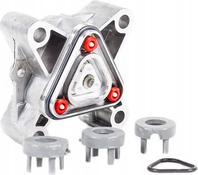 A close-up studio shot of a pump head component and its accessories against a white background.