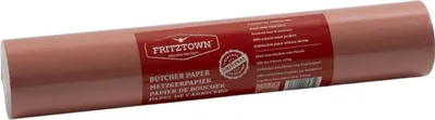 A roll of pink butcher paper with a red label.