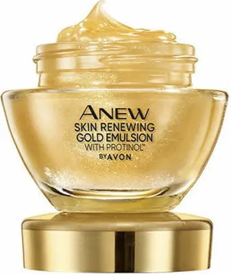 A close-up studio shot of a gold-colored cosmetic cream jar with its lid.