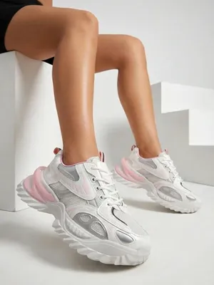 Produktbild von Weiße Sneaker mit rosa Akzenten und Netzeinsätzen, Größe 39