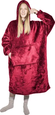 A woman wearing a burgundy hooded blanket.