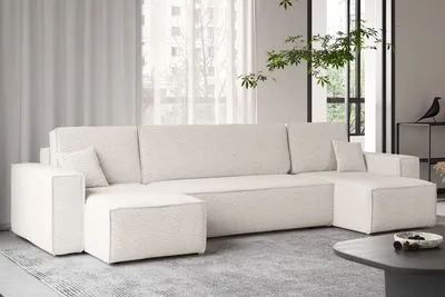 A modern living room with a large U-shaped sofa.