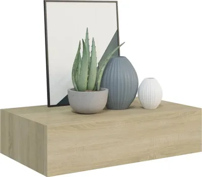 A floating shelf with decorative items on top.