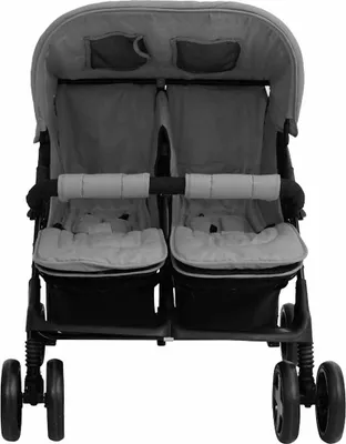 A front view of a twin stroller against a white background.