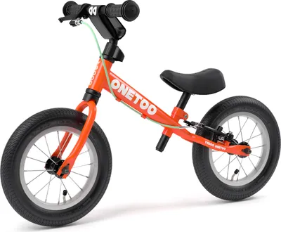 A bright orange balance bike with black handlebars and seat, shown against a plain white background.