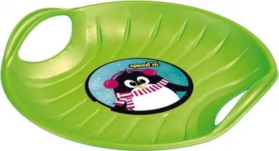 A green plastic sled with a cartoon penguin sticker on it, isolated on a white background.