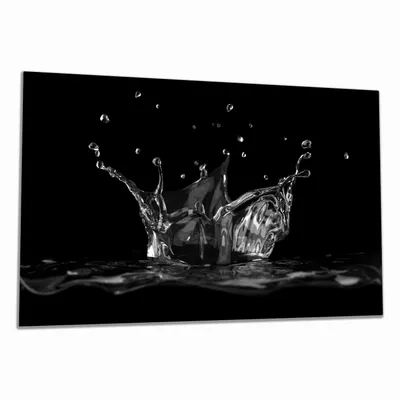 Produktbild von Wallario Herdabdeckplatte aus Glas, Größe 80 x 52 cm 1-teilig, Motiv Aufspritzendes Wasser Schwarz-Weiß