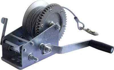 A metal winch with a cable and a crank handle, isolated on a white background.