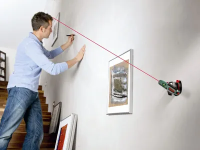 Produktbild von 5 m Arbeitsbereich - Laserwasserwaage mit Wandhalterung