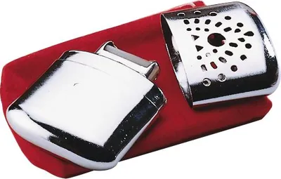 A chrome-plated hand warmer and its protective red pouch.
