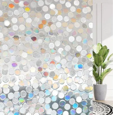 Immagine prodotto di Pellicola protettiva 3D per finestre Unyqoos® – adesiva tramite staticità e senza colla, protezione anti-UV (96%), motivo a cerchi, semitrasparente, 44,5 x 200 cm, riutilizzabile, non adatta per bagni