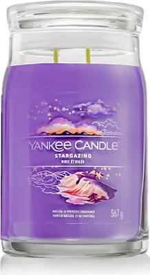 A Yankee Candle Stargazing jar candle with a glass lid.