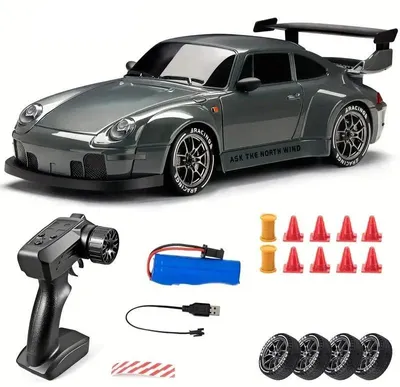 Immagine prodotto di Auto da drift RC - 1:24 4WD - Radiocomando a 2,4 GHz - Luci a LED - Velocità massima 15 km/h - Autonomia 20 min - Portata 40 m - Haze Blue