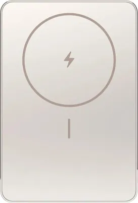 A top-down view of a gold wireless charger.