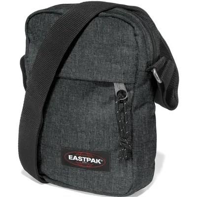 A close-up studio shot of a black Eastpak umhängetasche (shoulder bag).