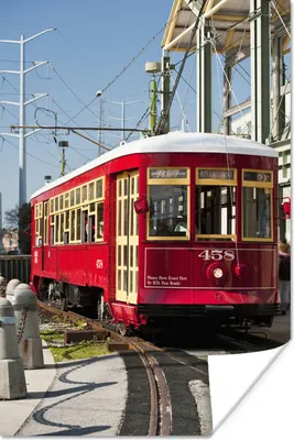 Produktbild von MuchoWow® Poster Eine rote Straßenbahn befördert Menschen in New Orleans 80x120 cm - Papierdruck