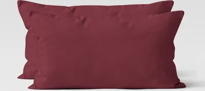 Two burgundy pillowcases are shown side-by-side against a light gray background.