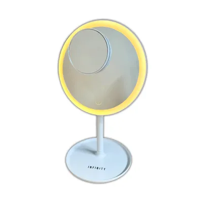 A white makeup mirror with a built-in LED light ring and a smaller magnifying mirror attached.