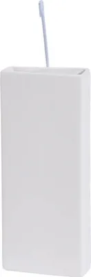 A white ceramic humidifier with a pen sticking out of it.