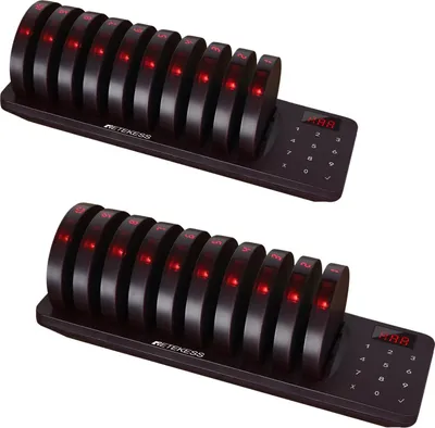 Two black pager charging bases with multiple pagers are shown against a white background.