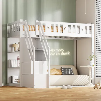 A white loft bed with stairs and storage is set up in a room with green striped walls and a sofa underneath.