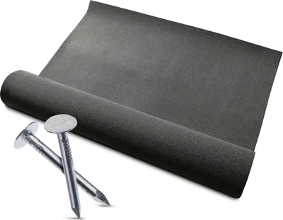 A roll of black bitumen roofing felt and two roofing nails are shown against a white background.