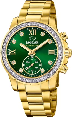 A close-up studio shot of a gold Jaguar watch with a green dial and diamond accents.