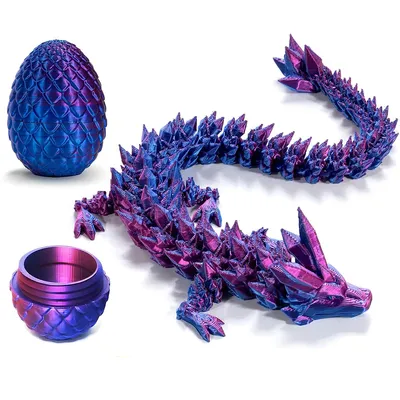 A 3D printed crystal dragon toy with a dragon egg and a small container, displayed on a white background.