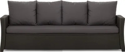 A studio shot of a dark gray outdoor sofa with four dark gray back cushions and a dark gray seat cushion.