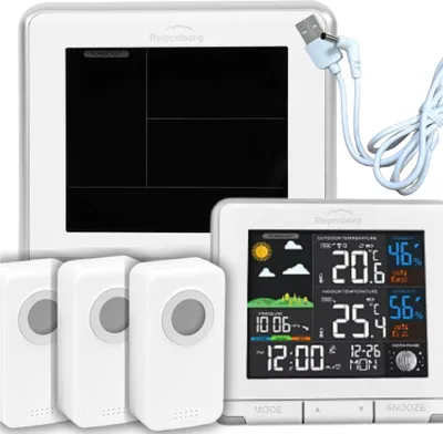 A weather station with multiple outdoor sensors and a main display unit.