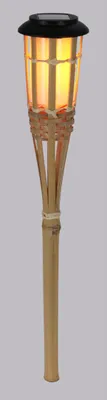 A solar-powered bamboo torch with a warm, glowing light.