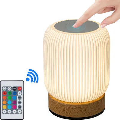 Produktbild von Multifunktionale Nachttischlampe mit 13 RGB-Farben, 6 Dimmstufen und Touch-Steuerung. Ideal für Kinderzimmer und Partys.