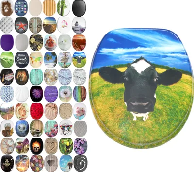 A collage of various toilet seat designs arranged to the left of a large toilet seat featuring a cow's head against a blue sky and green field.