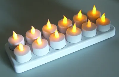 Obrázok produktu pre LED čajové sviečky, sada 12 kusov, s ochranou proti vetru, nabíjateľné na nabíjacej stanici