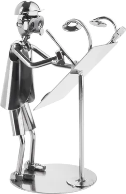 A metallic figurine of an architect standing at a drafting table with lights.