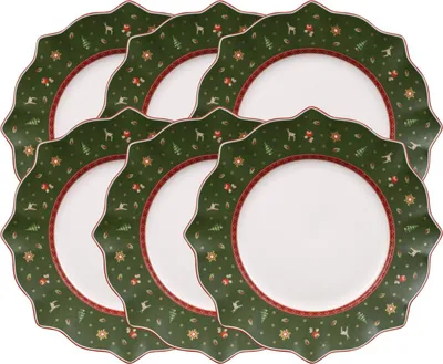 A set of six plates with a festive Christmas design.
