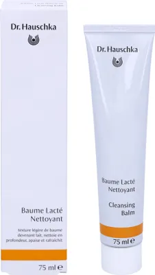 A product shot of a Dr. Hauschka Cleansing Balm tube and its packaging.