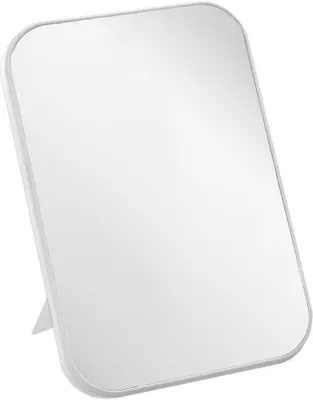 A white rectangular makeup mirror with a stand is shown against a white background.