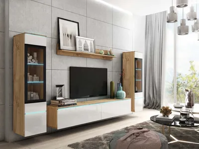 A modern living room with a wall-mounted entertainment unit.
