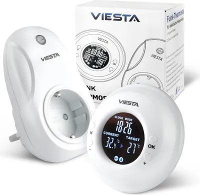 A white digital thermostat and a white plug-in socket are displayed on a white background, with the product's packaging in the background.