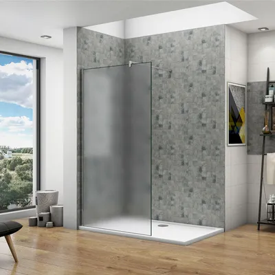 A modern bathroom with a walk-in shower, large window, and wooden floor.